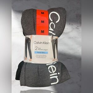 Calvin Klein Ladies' Joggers, 2-pack Color Black And  Dark Gray Size Medium.